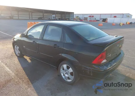 2003 Ford Focus Zts z USA, uszkodzony, nr VIN 1FAHP38323W251074
